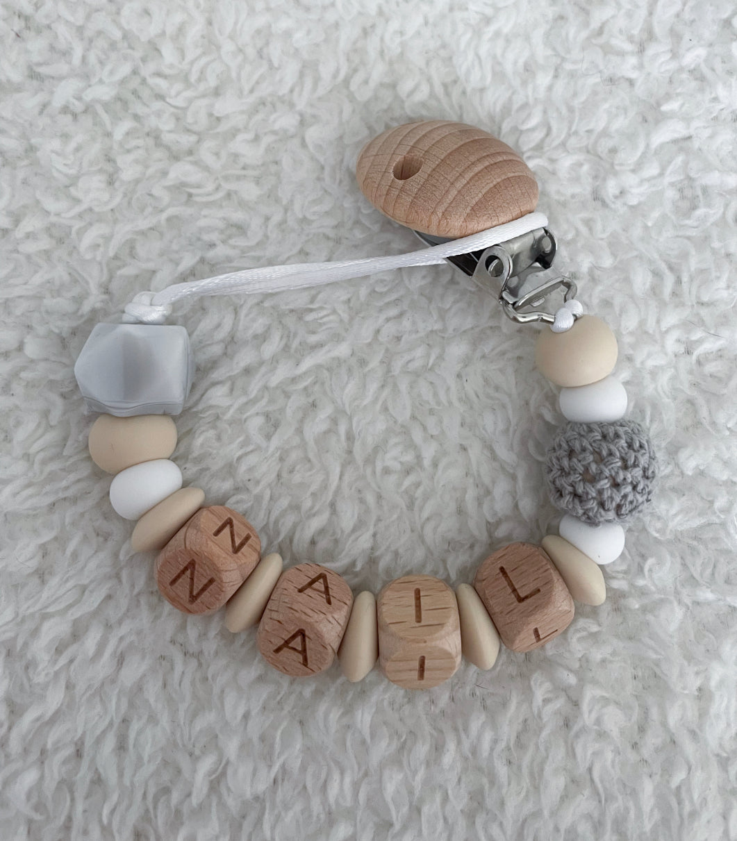 Attache tétine "Nail"